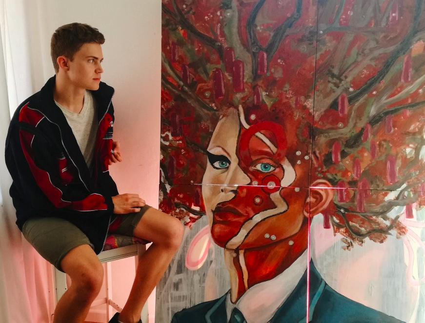 The artist and his piece “I Don’t Play Rugby”.